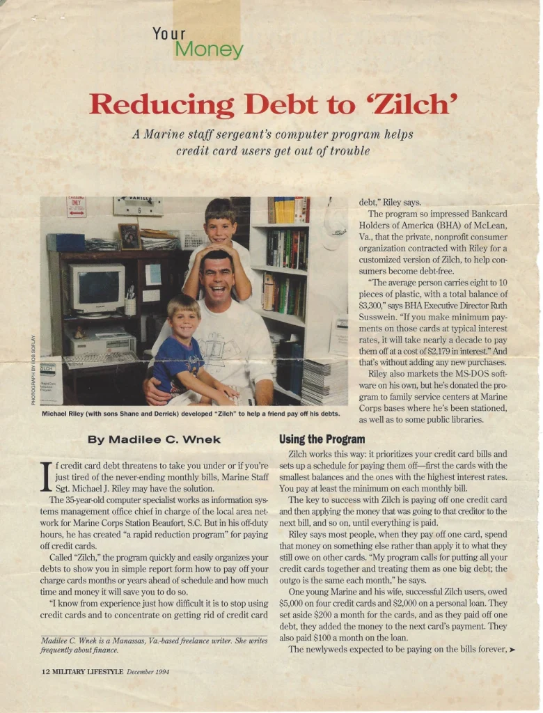 Page from Military Lifestyle magazine (December 1994) titled “Reducing Debt to ‘Zilch’,” featuring Marine Staff Sergeant Michael Riley’s home office and his early debt-reduction software, Zilch.