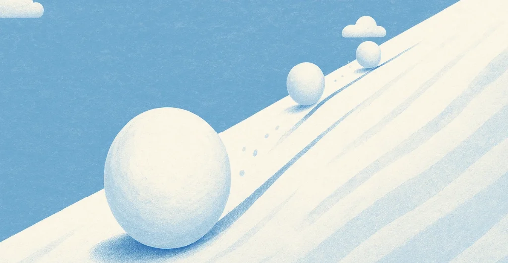 Illustration of a snowball rolling downhill, symbolizing the momentum of the Debt Snowball payoff method.